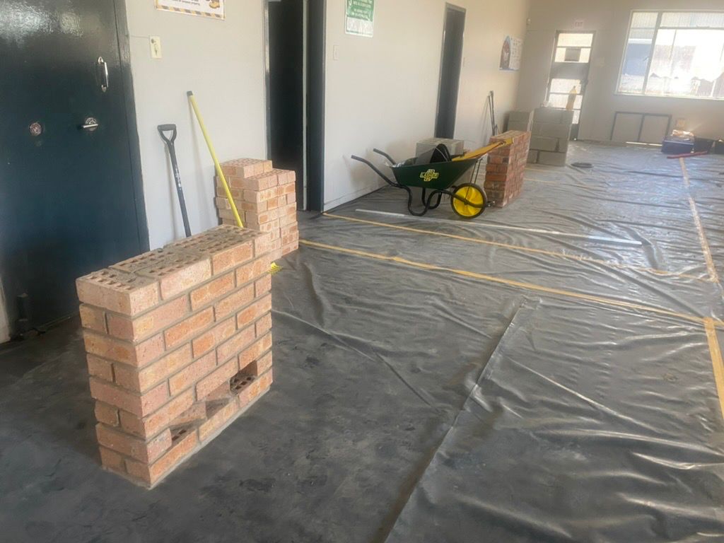 A bricklayer laying bricks